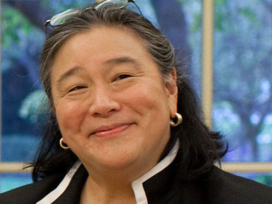 Tina Tchen, Director of the Office of Public Engagement, is briefed by Barack Obama in the Oval Office, Oct. 14, 2009.