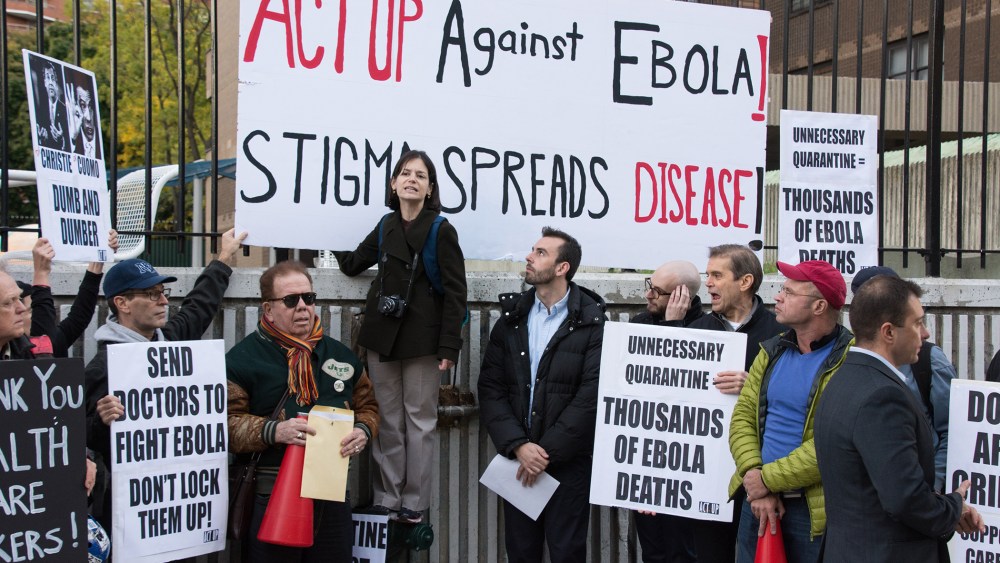 Annette Guadino of ACT UP speaks to protesters at Bellevue Hospital about policies regarding healthcare workers who cared for Ebola victims on Oct. 30, 2014.