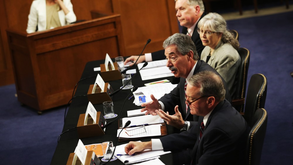 National Security Agency Deputy Director Richard Ledgett, Principal Deputy Director of National Intelligence Stephanie O'Sullivan, Deputy Attorney General James Cole, and FBI Deputy Director Mark Giuliano testify during a hearing before the Senate (Select
