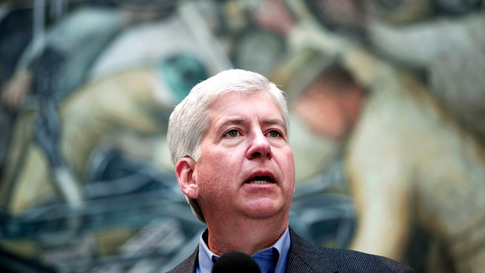 Michigan Gov. Rick Snyder speaks at a press conference at the Detroit Institute of Arts June 9, 2014 in Detroit, Mich. (Photo by Bill Pugliano/Getty)