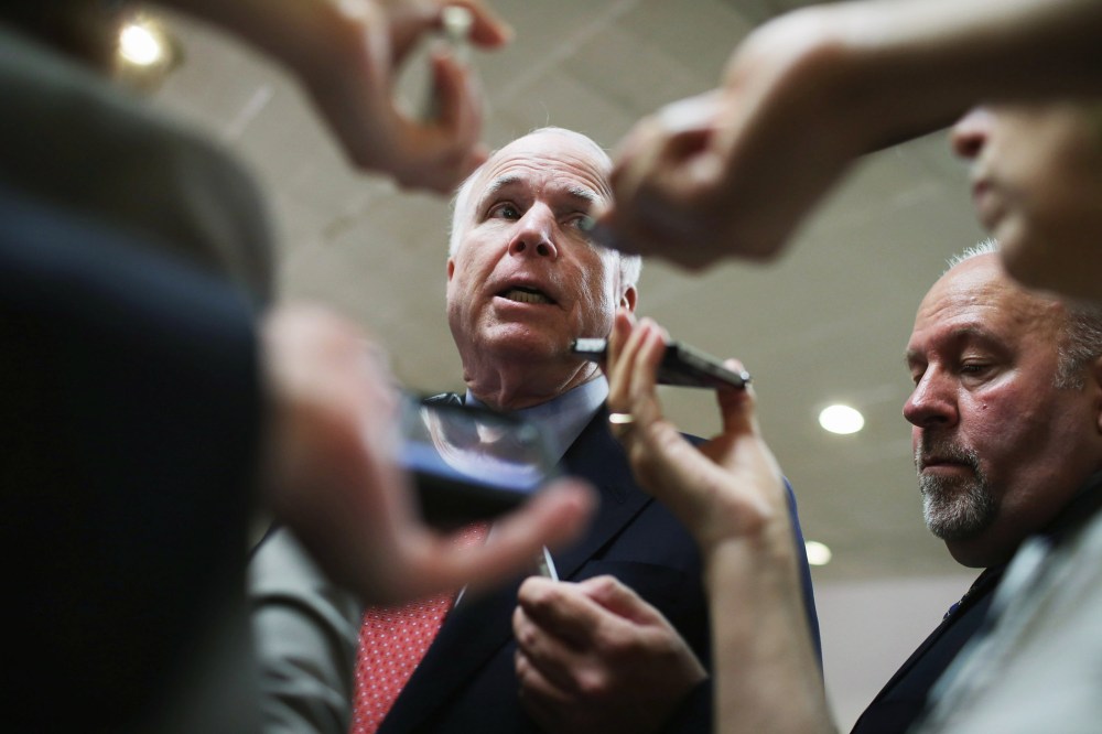 Senate Armed Services Committee Member U.S. Sen. John McCain (R-AZ) talks with reporters at the U.S. Capitol, June 10, 2014.