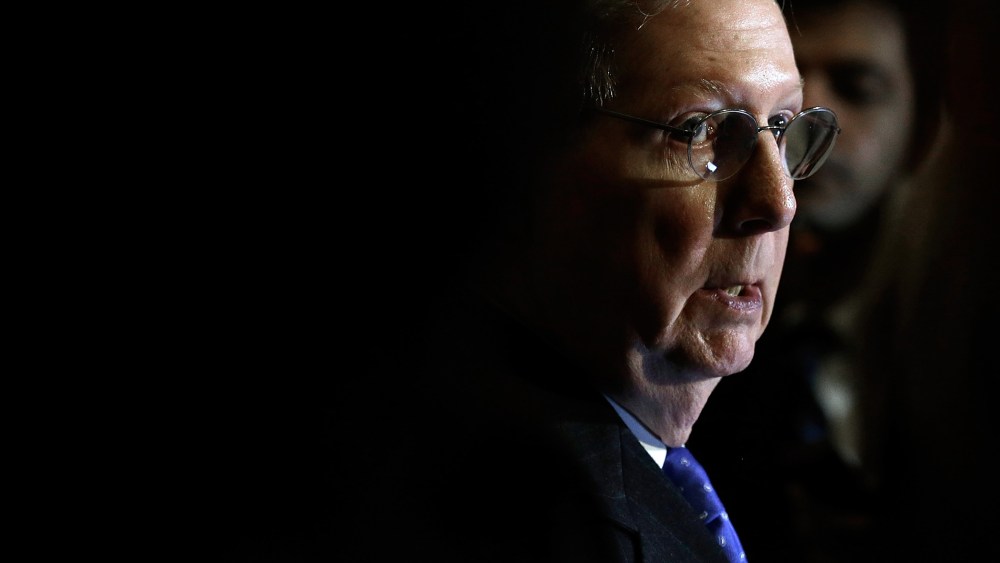 Senate Minority Leader Mitch McConnell (R-KY) speaks to reporters following the weekly policy lunch of the Republican caucus on Nov. 19, 2013 in Washington, D.C.