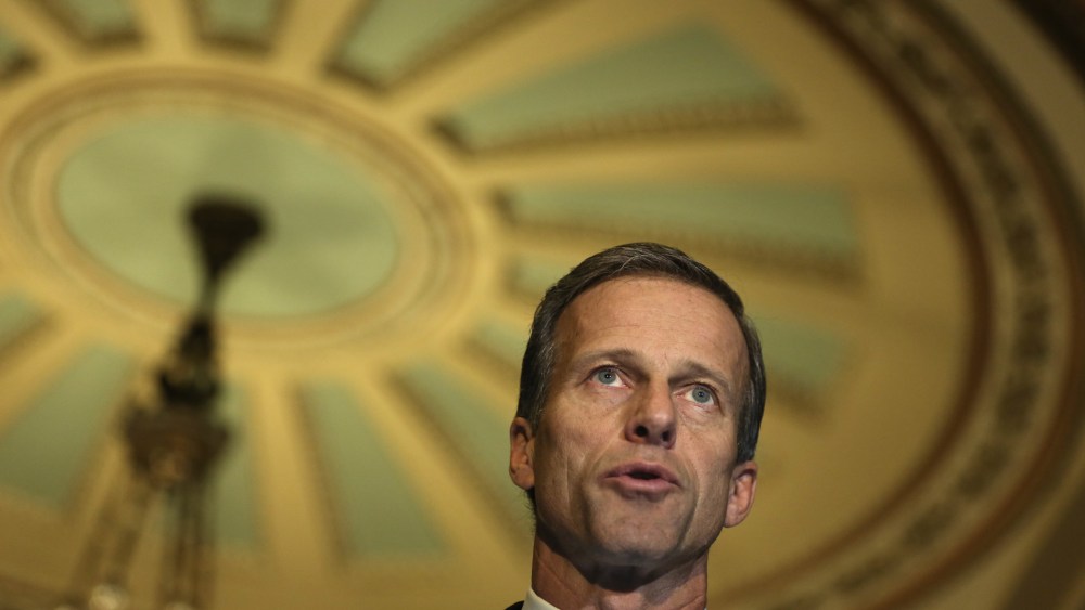 Senator John Thune (R-SD) speaks to members of the media, November 19, 2013 on Capitol Hill in Washington, D.C.