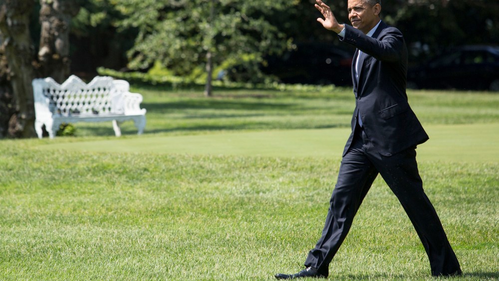 U.S. President Barack Obama walks toward Marine One on the South Lawn of the White House, on June 17, 2014.