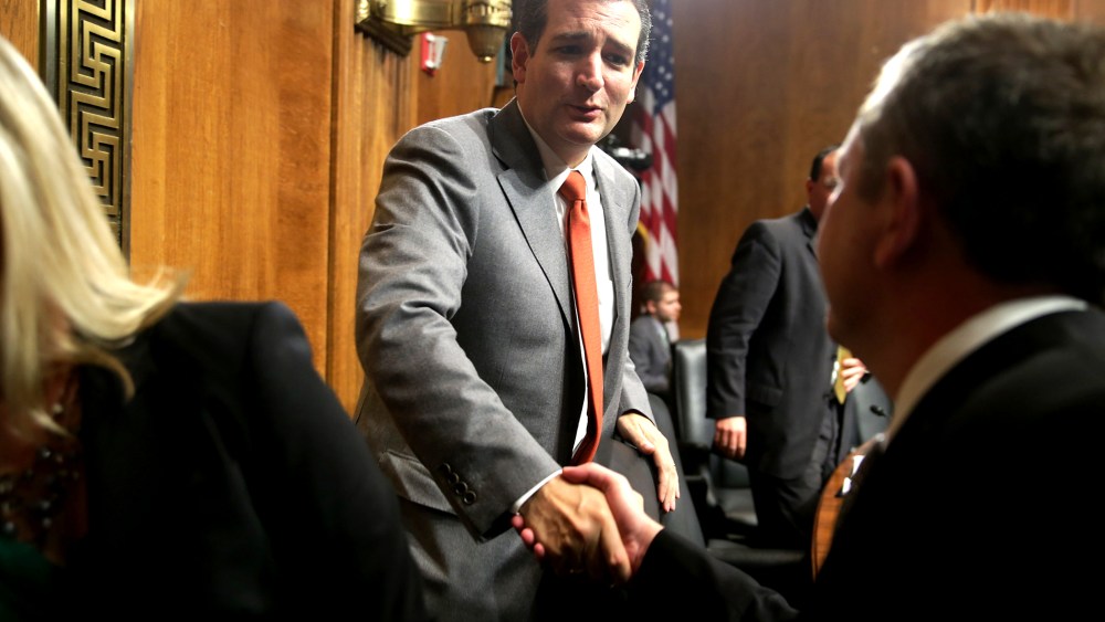 Senate Judiciary Committee member Sen. Ted Cruz (R-TX) (C) shakes hands with David Barron after his nomination hearing in the Dirksen Senate Office Building on Nov. 20, 2013 in Washington, DC.