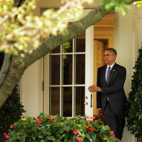 President Barack Obama steps out of the Oval Office as he departs the White House June 26, 2014 in Washington, DC.