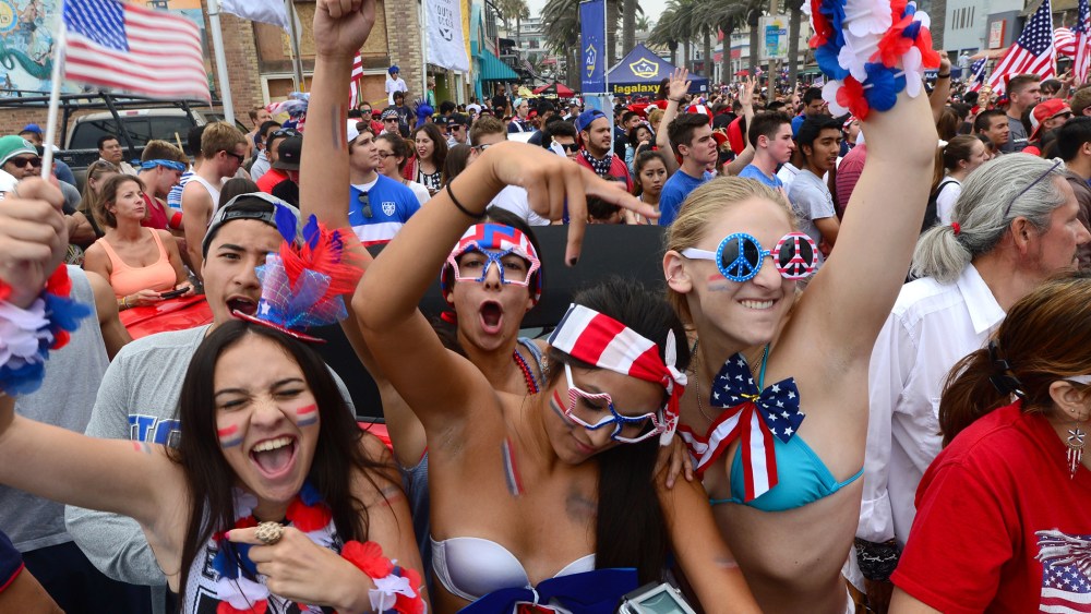 US fans gather to watch on a big screen at Hermosa Beach, California on June 26, 2014.