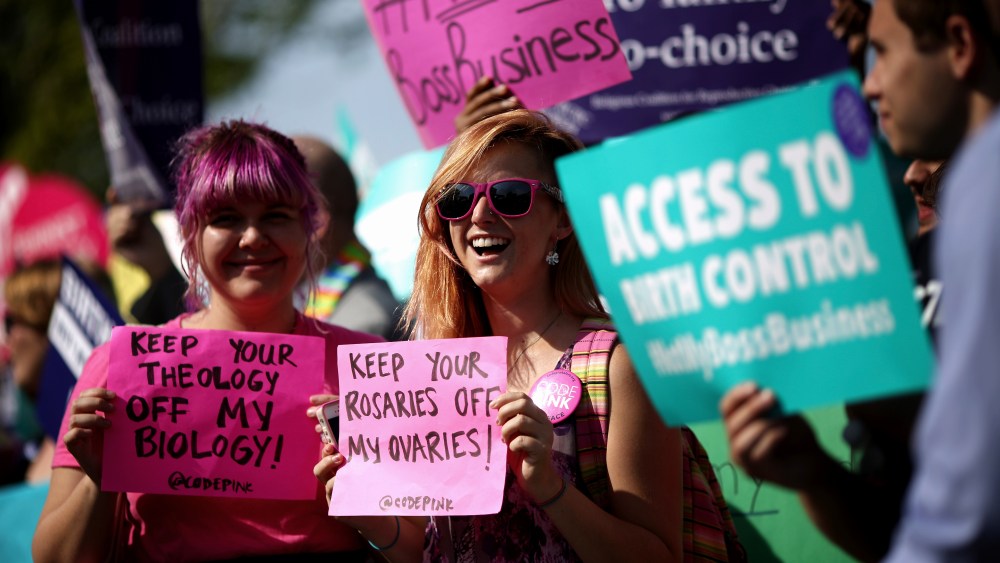 Supporters of employer-paid birth control rally in front of the Supreme Court before the decision in Burwell v. Hobby Lobby Stores was announced June 30, 2014 in Washington, DC. (Photo by Chip Somodevilla/Getty)