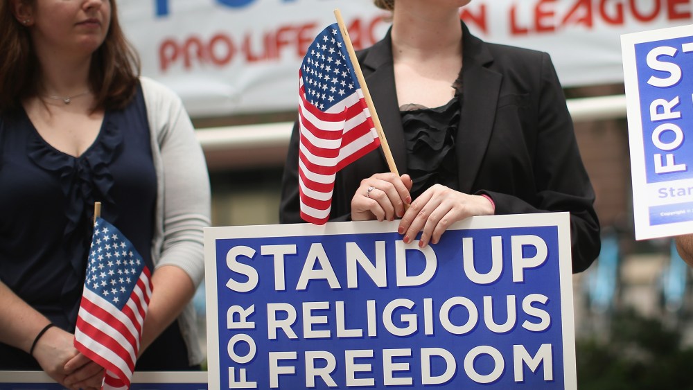 Religious freedom supporters hold a rally to praise the Supreme Court's decision in the Hobby Lobby contraception coverage requirement case on June 30, 2014 in Chicago, Ill. (Scott Olson/Getty)