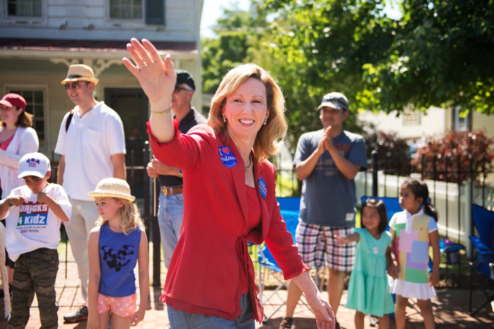 Barbara Comstock, Republican candidate for Virginia's 10th Congressional District, greets attendees of Leesburg's Independence Day parade, July 4, 2014.