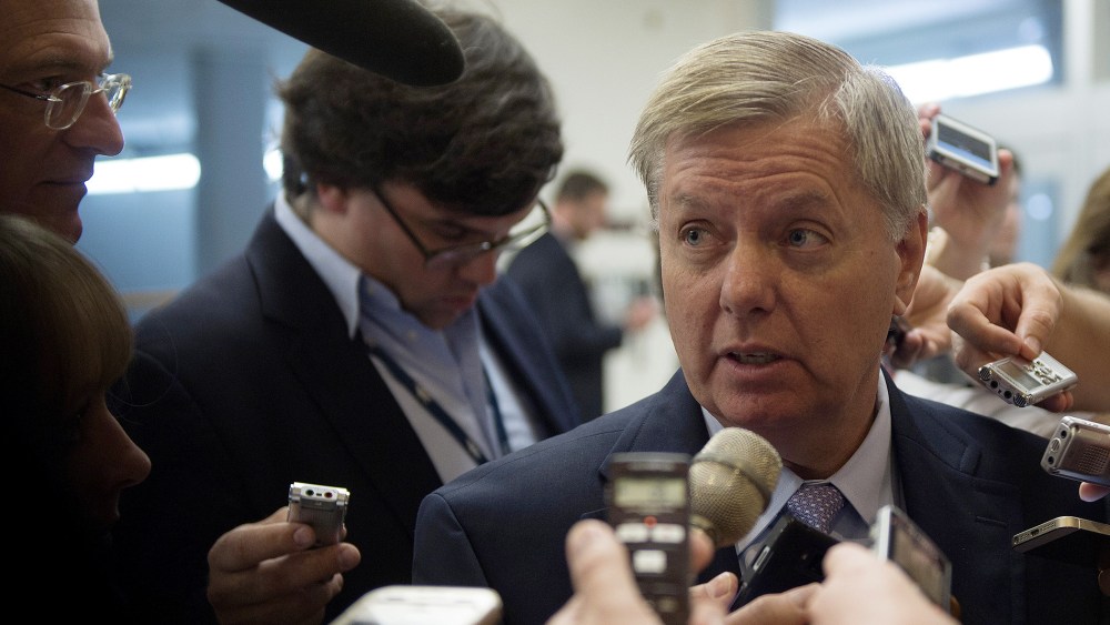 US Senator Lindsey Graham, R-SC, talks to reporters on Capitol Hill in Washington, DC on July 8, 2014.