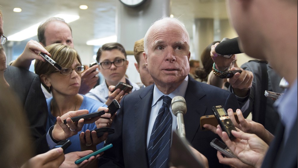 Senator John McCain , R-Ariz., talks to reporters after a closed meeting on Capitol Hill in Washington, D.C., July 8, 2014.