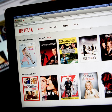 The Netflix Inc. website is displayed on laptop computers in this arranged photograph. (Photo by Andrew Harrer/Bloomberg/Getty)
