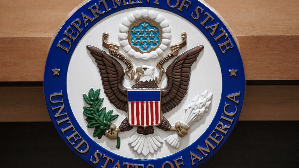 The US Department of State seal is seen Nov. 26, 2013 in the State Department briefing room in Washington, DC.