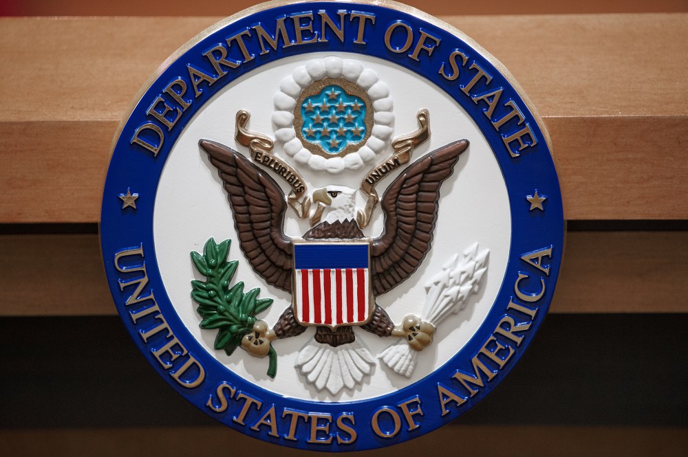 The US Department of State seal is seen Nov. 26, 2013 in the State Department briefing room in Washington, DC.