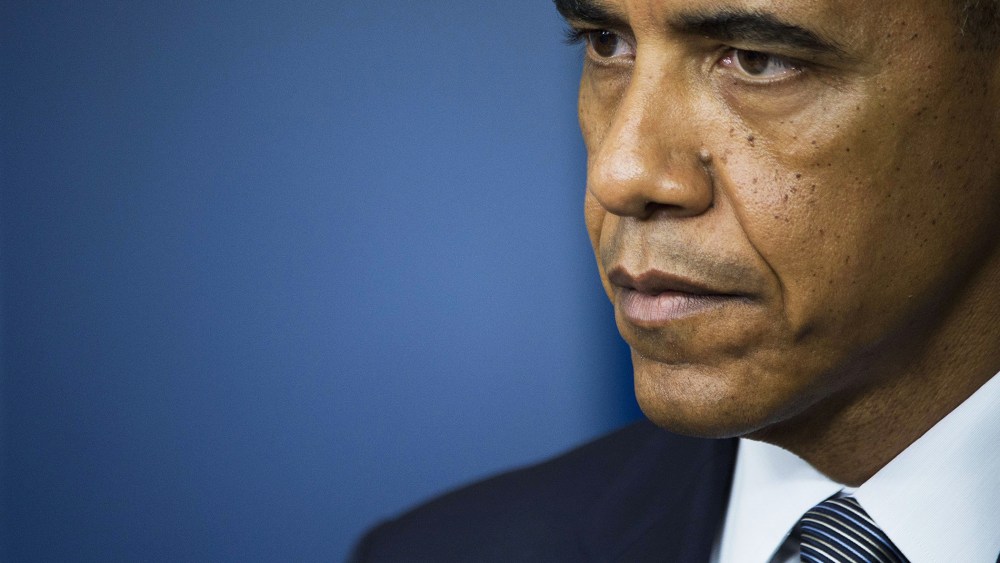 President Barack Obama makes a statement from the Brady Press Briefing Room at the White House in Washington, D.C., July 18, 2014. (Photo by Jim Watson/AFP/Getty)