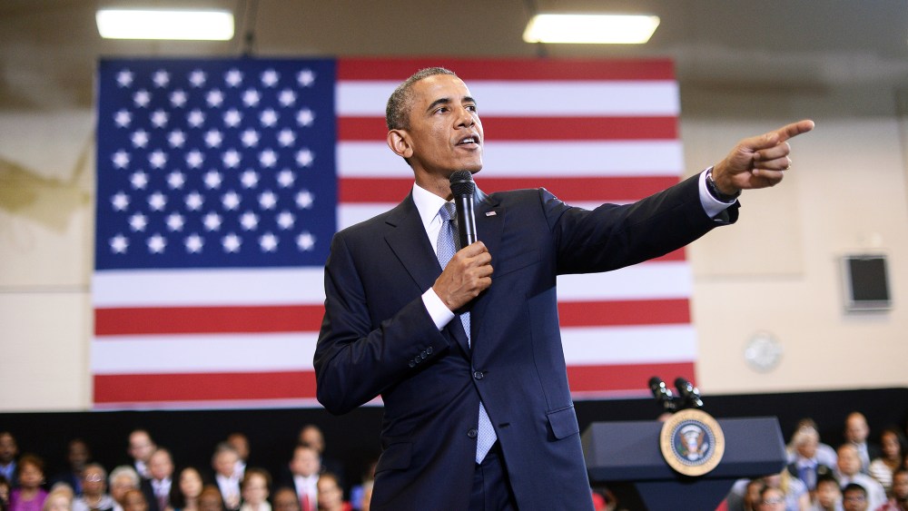 President Barack Obama speaks during a town hall meeting in Washington, DC, on July 21, 2014. (Photo by Jewel Samad/AFP/Getty)