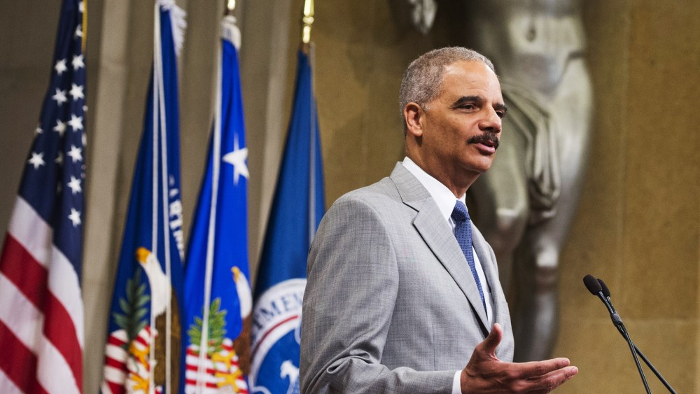 US Attorney General Eric Holder speaks during a Naturalization Ceremony at the Justice Department in Washington, DC, July 22, 2014.