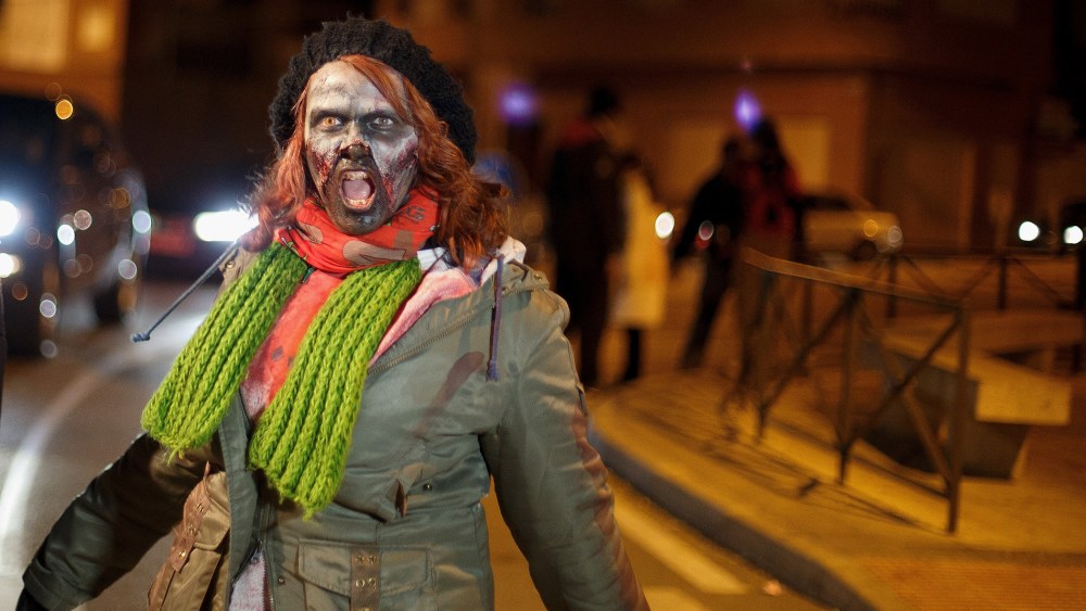 A zombie walks the streets during Zombie Survival contest on December 1, 2013 in Alameda de la Sagra, near Toledo, Spain.