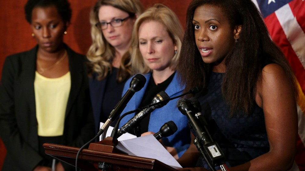 Wagatwe Wanjuki speaks about being a campus sexual assault survivor with Sen. Kristen Gillibrand and fellow survivors Annie Clark and Tre'Shonda Sheffey during a news conference at the US Capitol, July 30, 2014. (Photo by Chip Somodevilla/Getty)