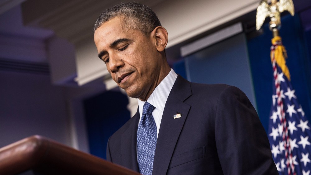 President Barack Obama pauses as he makes a statement in the briefing room of the White House on Aug. 1, 2014 in Washington, D.C.
