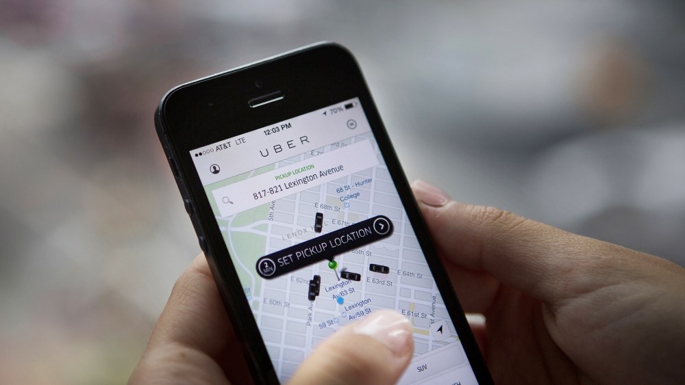 Th Uber Technologies Inc. car service application (app) is demonstrated for a photograph in New York on Aug. 6, 2014. (Photo by Victor J. Blue/Bloomberg/Getty)