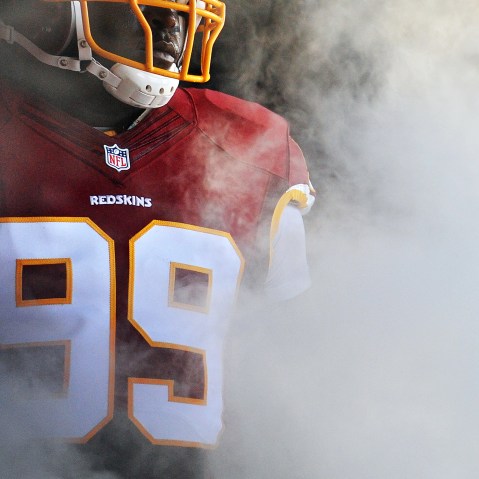 A player on the Washington Redskins waits to be introduced before playing during a preseason NFL game on Aug. 7, 2014 in Landover, Md.
