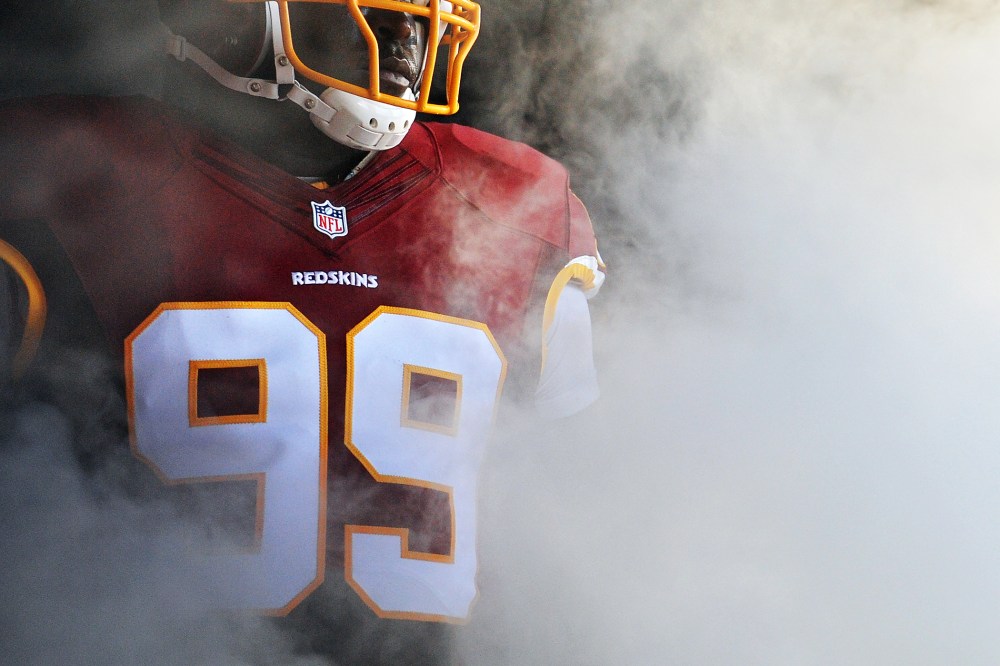 A player on the Washington Redskins waits to be introduced before playing during a preseason NFL game on Aug. 7, 2014 in Landover, Md.