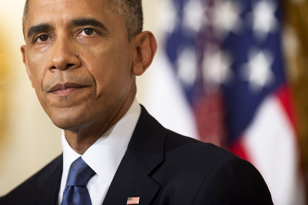 US President Barack Obama speaks in the State Dining Room at the White House, August 7, 2014.