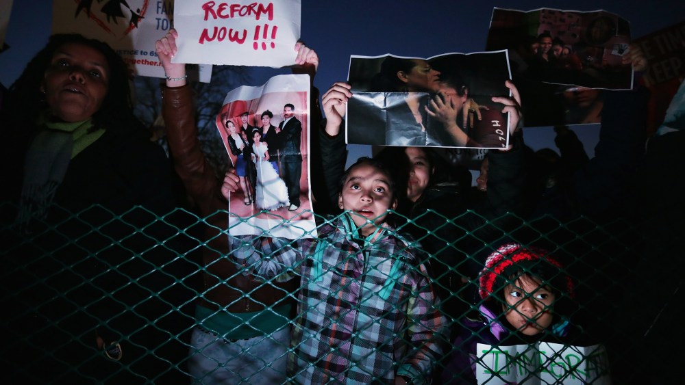A handful of immigration reform proponents demonstrate at the U.S. Capitol in Washington, DC, Dec. 3, 2013.