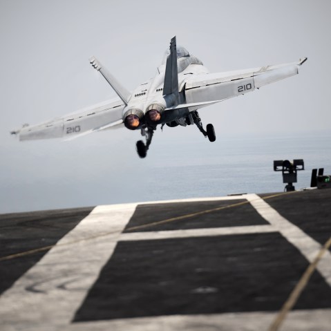 An F/A-18C hornet takes off for Iraq from the flight deck of the US navy aircraft carrier USS George H.W. Bush on Aug. 15, 2014 in the Gulf. (Photo by Mohammed Al-Shaikh/AFP/Getty)