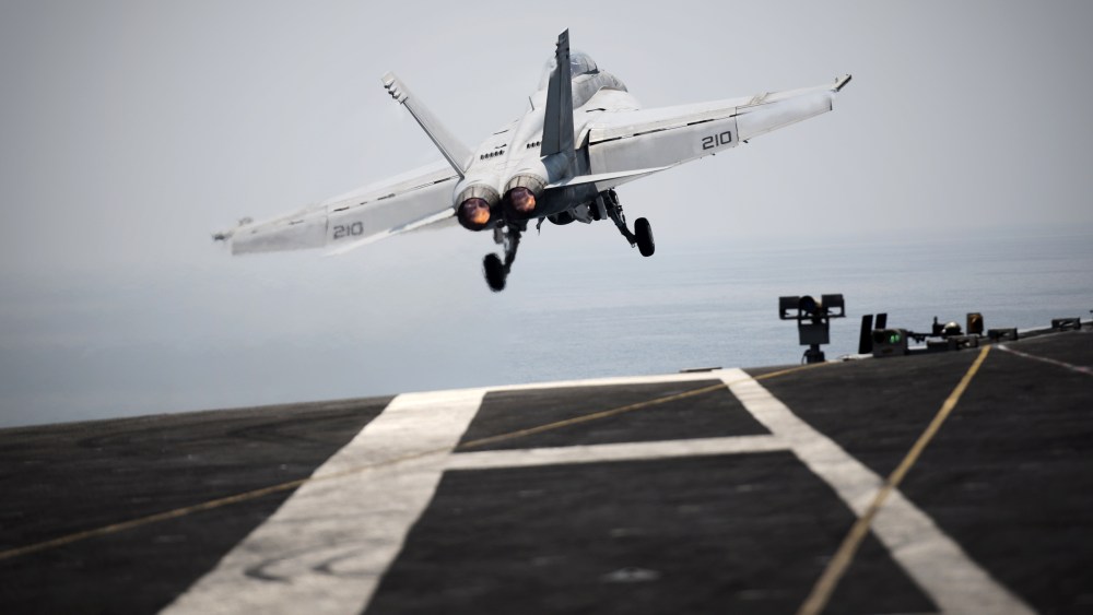 An F/A-18C hornet takes off for Iraq from the flight deck of the US navy aircraft carrier USS George H.W. Bush on Aug. 15, 2014 in the Gulf. (Photo by Mohammed Al-Shaikh/AFP/Getty)