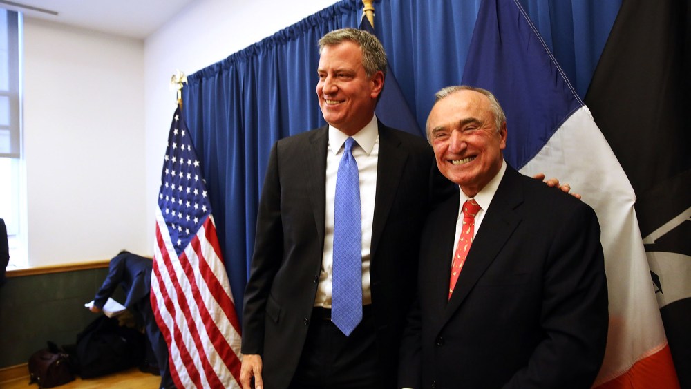 Incoming New York mayor Bill de Blasio stands with Bill Bratton, who has been named to lead the NYPD, Dec. 5, 2013.