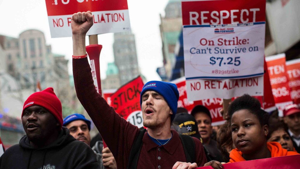 Protesters rally outside of a Brooklyn Wendy's in support of raising fast food wages from $7.25 per hour to $15.00 per hour, Dec. 5, 2013.