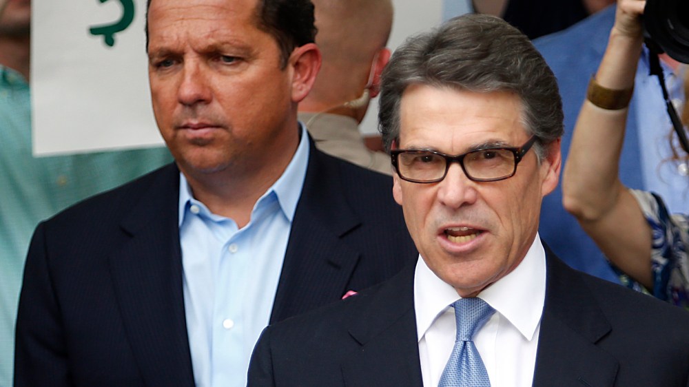 Texas Governor Rick Perry speaks to the media after turning himself in to authorities at the Blackwell-Thurman Criminal Justice Center on August 19, 2014 in Austin, Texas.