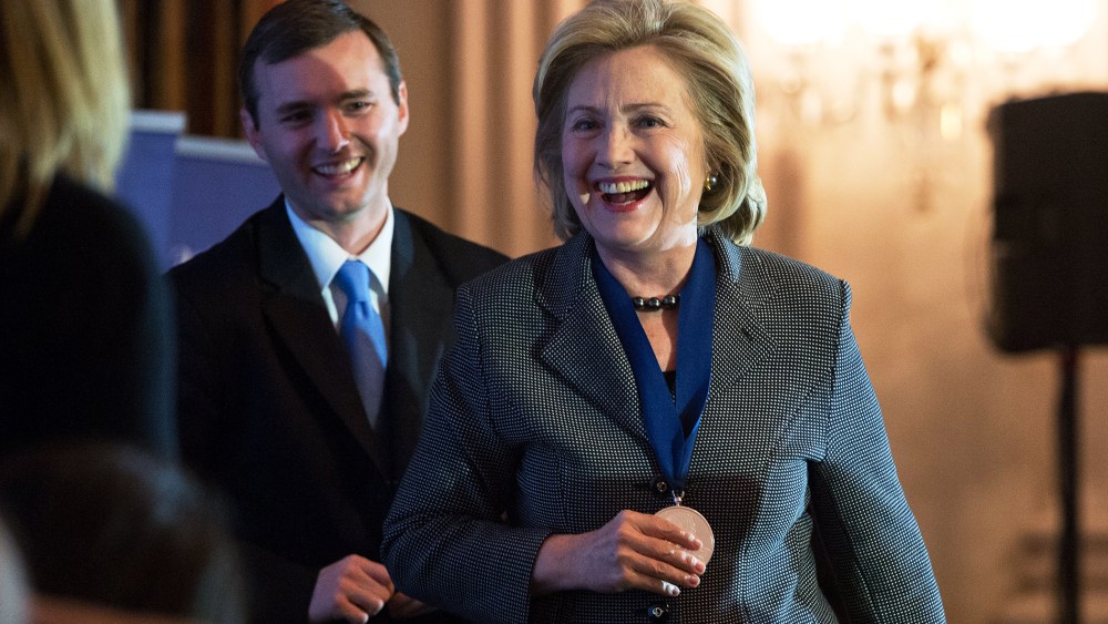 Hillary Clinton smiles after receiving the 2013 Lantos Human Rights Prize, Dec. 6, 2013.
