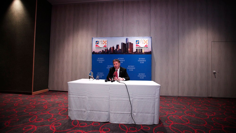 Sen. Rand Paul (R-KY) speaks with the news media after delivering a speech in Detroit, Michigan, December 6, 2013.