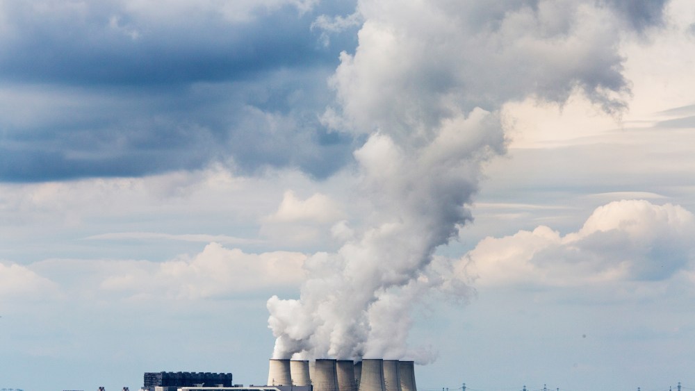 Steam rises from the cooling towers of the Jaenschwalde coal-fired power plant on Aug. 23, 2014 near Gross Gastrose, Germany.