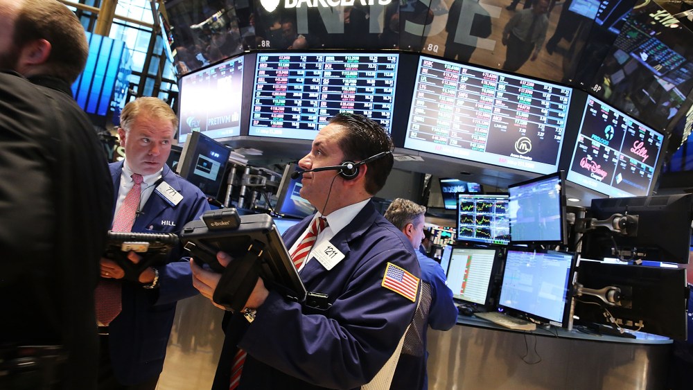 Traders work on the floor of the New York Stock Exchange (NYSE) on August 26, 2014 in New York City.