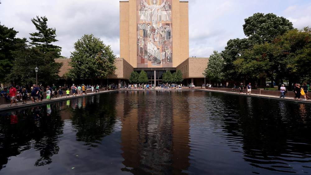 The mural at the Hesburgh Library, commonly known as "Touchdown Jesus" is seen on the campus of Notre Dame University on Aug. 30, 2014 in South Bend, Ind. (Photo by Jonathan Daniel/Getty)