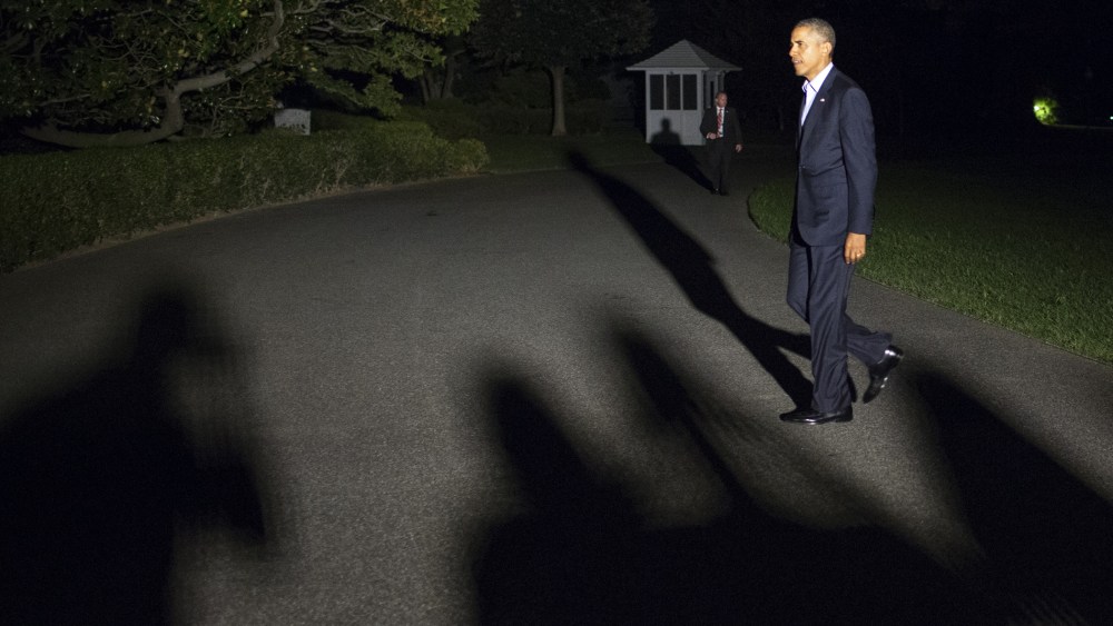 U.S. President Barack Obama walks from Marine One to the White House on September 5, 2014 in Washington, DC. Photo by Joshua Roberts/Getty.