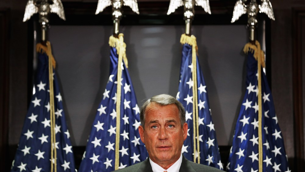 John Boehner takes reporters' questions following a closed-door conference meeting on Capitol Hill, Sept. 9, 2014.