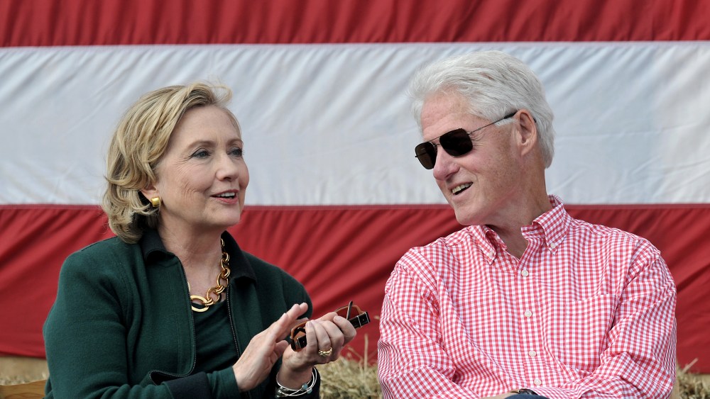 Former President Bill Clinton and his wife former Secretary of State Hillary Rodham Clinton attend the 37th Harkin Steak Fry, Sept. 14, 2014 in Indianola, Iowa.