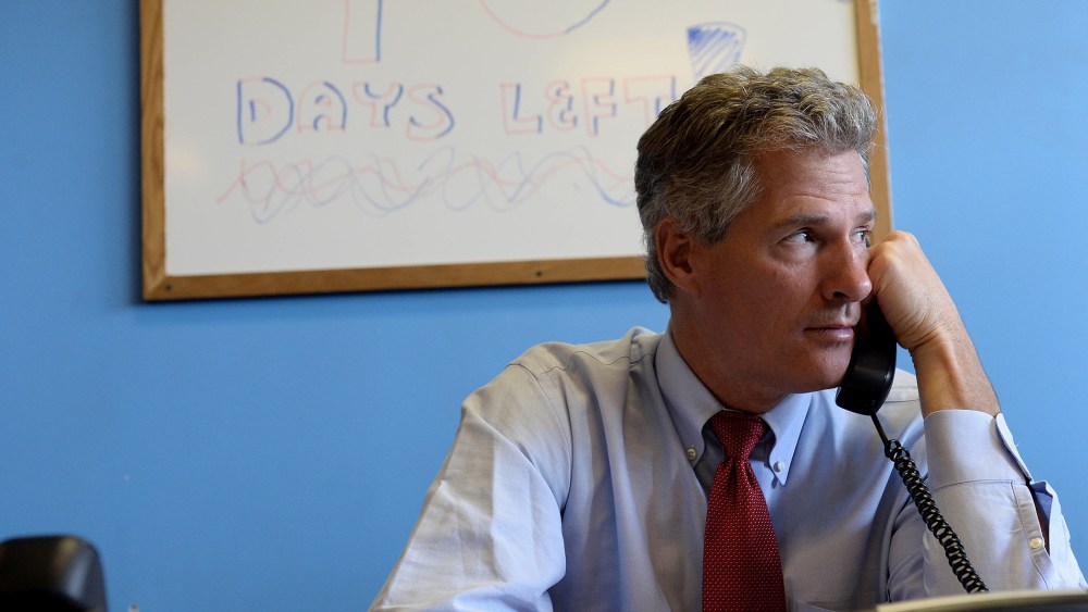 Scott Brown works the phone banks at the New Hampshire GOP Salem headquarters on Sept. 17, 2014 in Salem, N.H. (Photo by Darren McCollester/Getty)