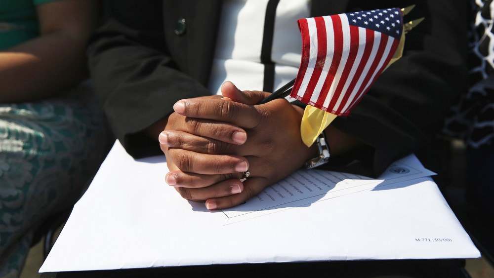 Immigrants prepare to become U.S. citizens at a naturalization ceremony at Liberty State Park on September 19, 2014 in Jersey City, New Jersey.