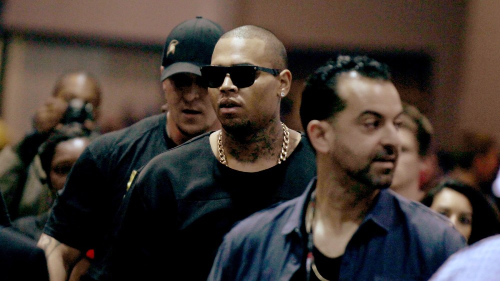 Recording artist Chris Brown (C) attends the 2014 iHeartRadio Music Festival at the MGM Grand Garden Arena on Sept. 19, 2014 in Las Vegas, Nevada.