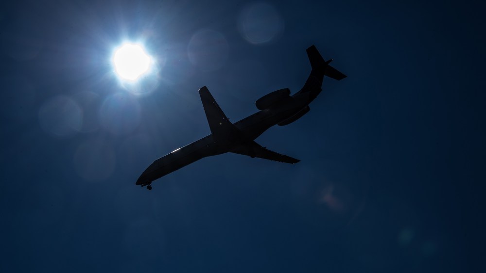A plane comes in to land. (Photo by Nicholas Kamm/AFP/Getty)