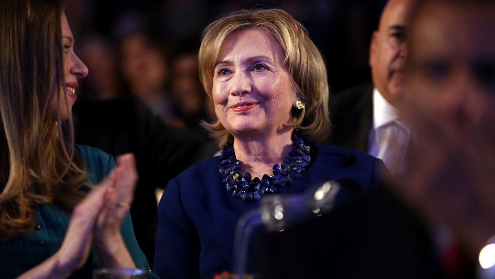 Former U.S. Secretary of State Hillary Clinton watch from the audience as U.S. President Barack Obama, speaks at the Clinton Global Initiative on Sept. 23, 2014 in New York City.