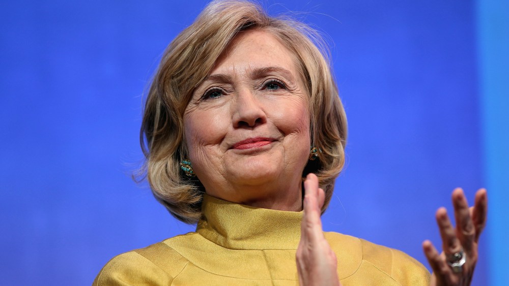 Former U.S. Secretary of State Hillary Clinton applauds on stage during the Clinton Global Initiative (CGI), on Sept. 24, 2014 in New York City.