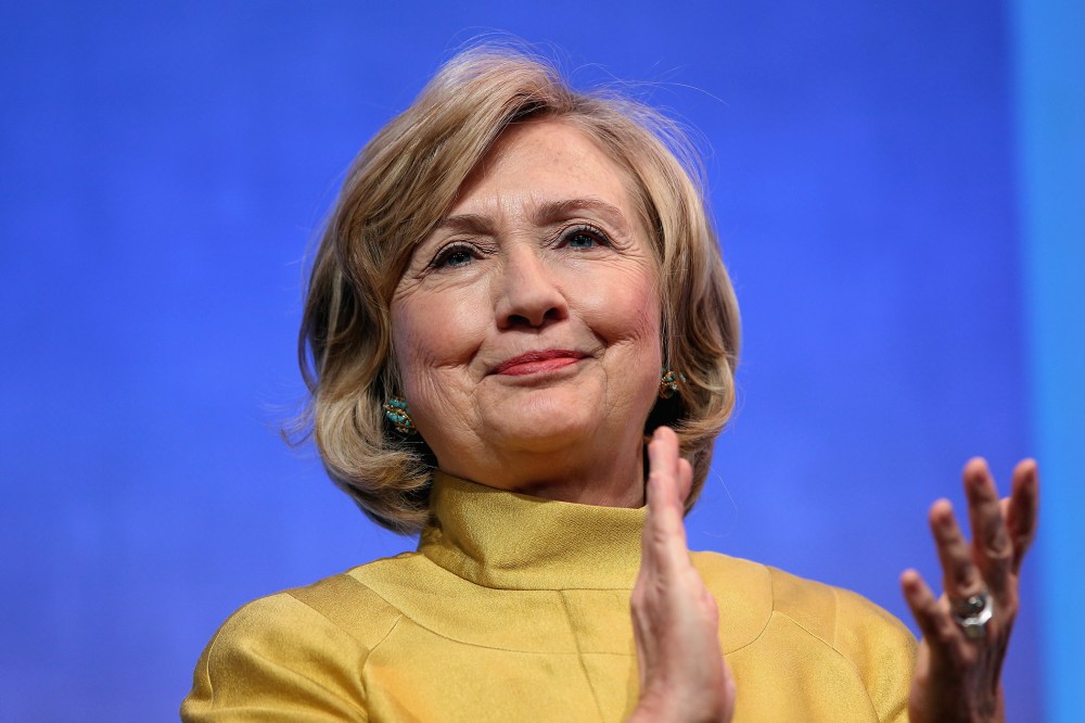 Former U.S. Secretary of State Hillary Clinton applauds on stage during the Clinton Global Initiative (CGI), on Sept. 24, 2014 in New York City.